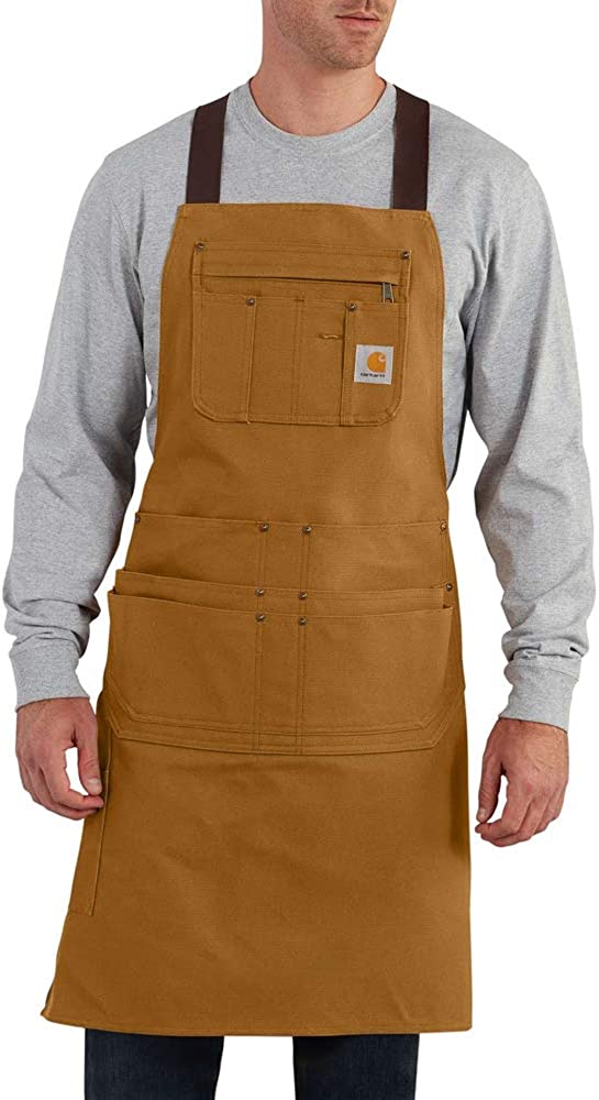 Man wearing Carhartt Firm Duck apron in brown canvas with tool pockets
